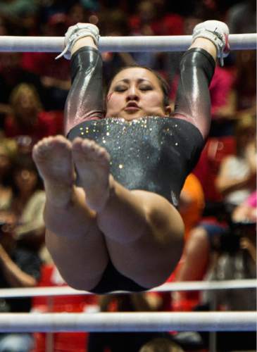 Rick Egan  |  The Salt Lake Tribune

Carrie Lothrop competes on the bars for the Utes, in the Pac-12 Gymnastics Championships at the Huntsman Center, Saturday, March 21, 2015.