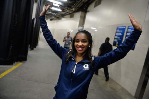 Scott Sommerdorf   |  The Salt Lake Tribune
A Georgetown cheerleader poses in the hallway prior to game time, Saturday, March 21, 2015.