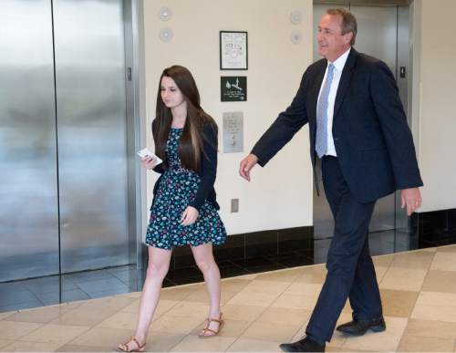 Rick Egan  |  The Salt Lake Tribune

Former Attorney General Mark Shurtleff and his daughter Annie make their way to Judge Randall Skanchy's courtroom at the Matheson Courthouse for Shurtleff's scheduling hearing Monday, March 23, 2015.  Third District Court Judge Randall Skanchy set a June 15 date for a hearing to determine whether Shurtleff will stand trial on bribery and corruption charges.