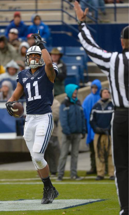 Leah Hogsten  |  The Salt Lake Tribune
Brigham Young Cougars wide receiver Terenn Houk (11) catches a 9yd pass for a touchdown in the first half. Brigham Young University leads Savannah State 51-0 at the half, November 22, 2014, at LaVell Edwards Stadium in Provo.
