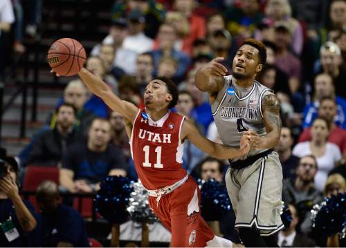 Scott Sommerdorf   |  The Salt Lake Tribune
Utah Utes guard Brandon Taylor (11) reaches for a pass that was out of the reach of Georgetown Hoyas guard D'Vauntes Smith-Rivera (4) during second half play. Utah defeated Georgetown 75-64 to advance to the "Sweet Sixteen", Saturday, March 21, 2015.