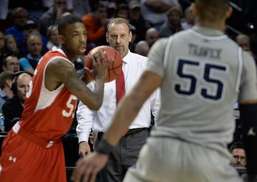 Scott Sommerdorf   |  The Salt Lake Tribune
Utah Utes head coach Larry Krystkowiak watches as Utah Utes guard Delon Wright (55) handles the ball late in the game. Utah defeated Georgetown 75-64 to advance to the "Sweet Sixteen", Saturday, March 21, 2015.