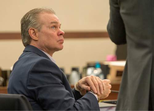 Rick Egan  |  The Salt Lake Tribune

Douglas Anderson Lovell, listens to his attorney, during proceedings in Judge Michael DiReda's 2nd District Court in Ogden, Friday, March 27, 2015.  Lovell, has been convicted of aggravated murder for kidnapping and killing 39-year-old Joyce Yost in 1985 to keep her from testifying against him in a rape case.