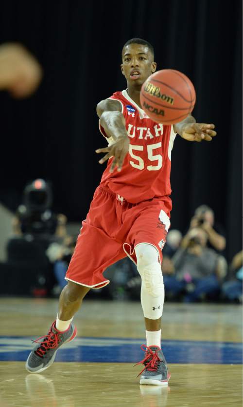 Steve Griffin  |  The Salt Lake Tribune

Utah Utes guard Delon Wright (55) passes into the post during second half action in the University of Utah versus Duke University Sweet 16 game in the 2015 NCAA Men's Basketball Championship Regional Semifinal game at NRG Stadium in Houston, Friday, March 27, 2015.