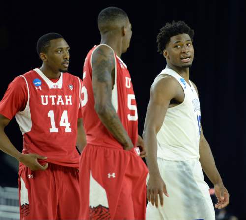 Steve Griffin  |  The Salt Lake Tribune

Duke Blue Devils forward Justise Winslow (12), right, and Utah Utes guard Delon Wright (55) exchange words at the end of the the University of Utah versus Duke University Sweet 16 game in the 2015 NCAA Men's Basketball Championship Regional Semifinal game at NRG Stadium in Houston, Friday, March 27, 2015.