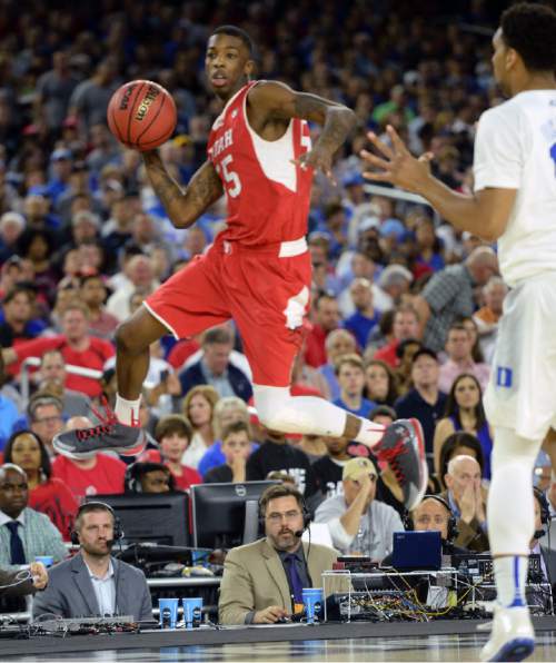 Steve Griffin  |  The Salt Lake Tribune

Utah Utes guard Delon Wright (55) leaps into the air to save the ball during first half action in the University of Utah versus Duke University Sweet 16 game in the 2015 NCAA Menís Basketball Championship Regional Semifinal game at NRG Stadium in Houston, Friday, March 27, 2015.