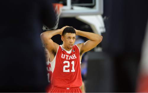 Steve Griffin  |  The Salt Lake Tribune

Utah Utes forward Jordan Loveridge (21) holds his head in his hands as the Utes take a timeout as Duke builds a double digit lead during second half action in the University of Utah versus Duke University Sweet 16 game in the 2015 NCAA Men's Basketball Championship Regional Semifinal game at NRG Stadium in Houston, Friday, March 27, 2015.