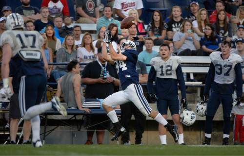 Scott Sommerdorf   |  The Salt Lake Tribune
BYU WR Anthony Armstrong hauled in this long pass as BYU football had it's first scrimmage, Friday, March 27, 2015.