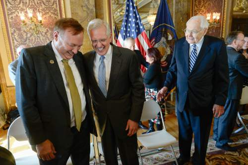 Francisco Kjolseth  |  The Salt Lake Tribune 
Sen. Jim Dabakis, D-Salt Lake, left, greets top Mormon leaders, including apostle D. Todd Christofferson, center, and L. Tom Perry, second in line for the LDS Church's presidency, as they appear at a news conference at the Capitol to publicly endorse nondiscrimination bill SB296.