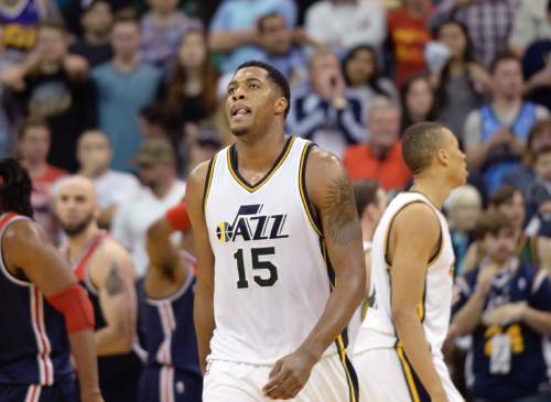 Steve Griffin  |  The Salt Lake Tribune

Utah Jazz forward Derrick Favors (15) looks up into the stands after the Jazz turned the ball over late in the fourth quarter in the Utah Jazz versus Washington Wizards NBA basketball game at EnergySolutions Arena in Salt Lake City, Wednesday, March 18, 2015.