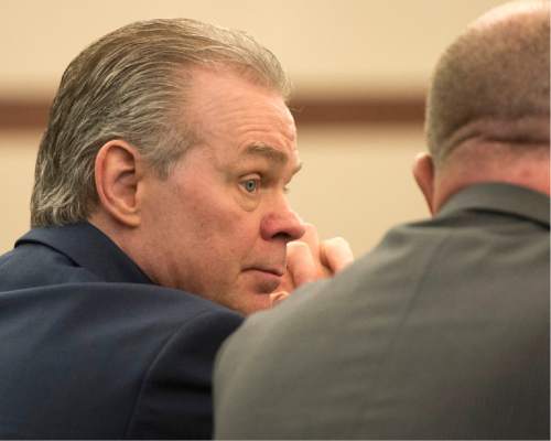 Rick Egan  |  The Salt Lake Tribune

Douglas Anderson Lovell, listens to his attorney, during proceedings in Judge Michael DiReda's 2nd District Court in Ogden, Friday, March 27, 2015.  Lovell, has been convicted of aggravated murder for kidnapping and killing 39-year-old Joyce Yost in 1985 to keep her from testifying against him in a rape case.
