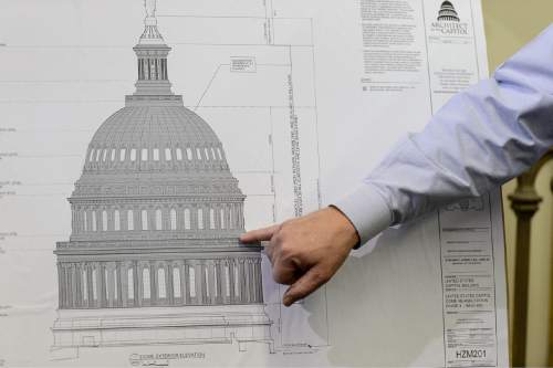 Trent Nelson  |  The Salt Lake Tribune
Steven Brown of Historical Arts & Casting in West Jordan points out features on the U.S. Capitol dome, Tuesday March 31, 2015. The foundry is where pieces of the dome's cast iron ornamentation that cannot be repaired will be recast and sent back to Washington, D.C., for replacement on the Capitol.