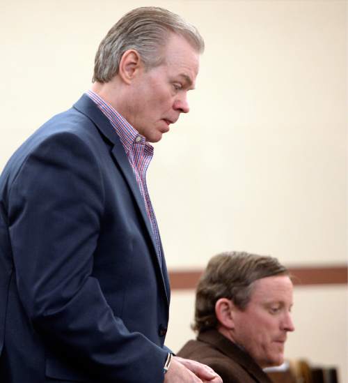 Al Hartmann  |  The Salt Lake Tribune 
Douglas Anderson Lovell, 57, convicted of aggravated murder for kidnapping and killing 39-year-old Joyce Yost in 1985 to keep her from testifying against him in a rape case, enters the courtroom in Ogden Tuesday March 31, 2015, for the last day of his death penalty trial. The prosecution and defense gave their closing arguments Tuesday.