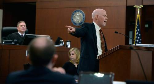 Al Hartmann  |  The Salt Lake Tribune 
 Deputy Weber County Attorney Christopher Shaw gives closing arguments to the jury in Ogden Tuesday March 31, 2015, asking for the death penalty for Douglas Anderson Lovell. He points to him at the defense table. Lovell, 57, has been convicted of aggravated murder for kidnapping and killing 39-year-old Joyce Yost in 1985 to keep her from testifying against him in a rape case.