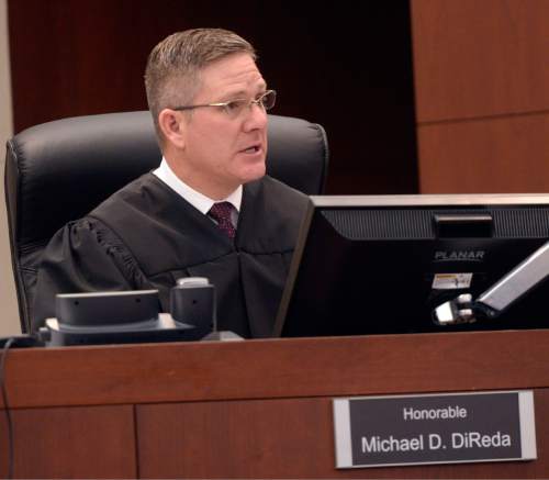 Al Hartmann  |  The Salt Lake Tribune 
 Judge Michael D. DiReda gives detailed instrutions to the jury before the defense and prosecution give closing arguments in Ogden Tuesday March 31, 2015. The prosecution asked for the death penalty for Douglas Anderson Lovell. Lovell, 57, has been convicted of aggravated murder for kidnapping and killing 39-year-old Joyce Yost in 1985 to keep her from testifying against him in a rape case.