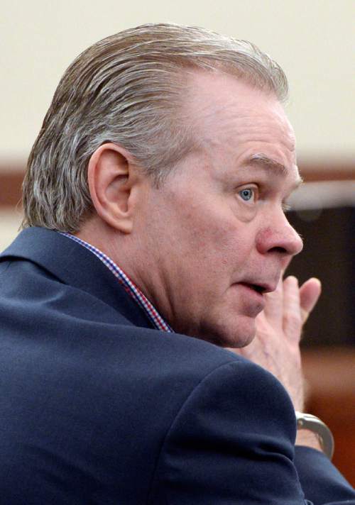 Al Hartmann  |  The Salt Lake Tribune 
Douglas Anderson Lovell, 57, convicted of aggravated murder for kidnapping and killing 39-year-old Joyce Yost in 1985 to keep her from testifying against him in a rape case listens to lawyers' closing arguments in Ogden Tuesday March 31, 2015, on the last day of his death penalty trial.