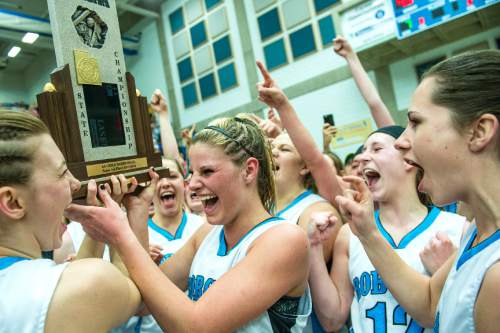 Chris Detrick  |  The Salt Lake Tribune
Sky View's Lindsey Jensen (11) and her teammates celebrate after winning the 4A State Championship game at Salt Lake Community College Lifetime Activities Center Saturday February 21, 2015. Sky View defeated Skyline 43-32.