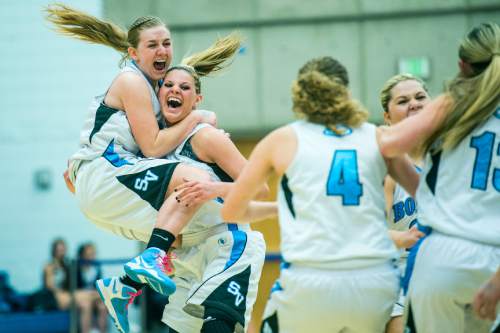 Chris Detrick  |  The Salt Lake Tribune
Sky View's Daisy Karren (31) and Sky View's Lindsey Jensen (11) celebrate after winning the 4A State Championship game at Salt Lake Community College Lifetime Activities Center  Saturday February 21, 2015. Sky View defeated Skyline 43-32.