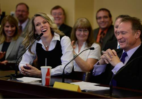 Scott Sommerdorf   |  The Salt Lake Tribune
Tenille Farr laughs along with Senator Mark Madsen, R-Salt Lake, after she mistakenly referred to him as "Governor Madsen" as she gave her presentation in favor of his bill, SB259 Medical Cannabis Amendments - in committee, Thursday, February 26, 2015.