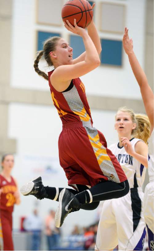 Steve Griffin  |  The Salt Lake Tribune

Viewmont's Katie Toole hangs in the air as she shoots a jumper during second round game against Riverton in the girl's 5A basketball state tournament at SLCC in Taylorsville, Wednesday, February 18, 2015.