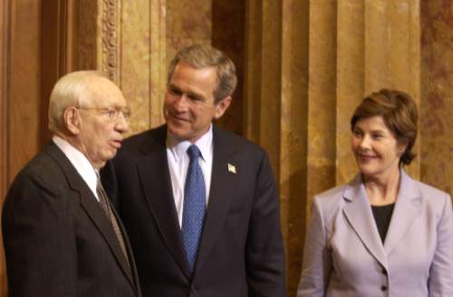 Tribune file photo

President George Bush and Laura Bush meet with LDS Church President Gordon B. Hinckley in Salt Lake City just before the Olympics in 2002.