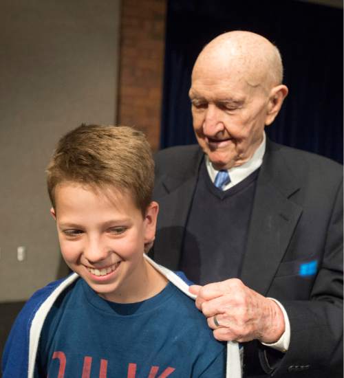 Rick Egan  |  The Salt Lake Tribune

Gail Halvorsen, 94 years old and known around the world as the Berlin Candy Bomber, autographs Jakes Sexton's sweater at Oquirrh Hills Middle School, Wednesday, April 1, 2015.