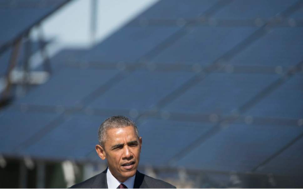 Steve Griffin  |  The Salt Lake Tribune

President Barack Obama delivers a speech in front of solar panels at Hill Air Force Base  in Ogden, Friday, April 3, 2015.
