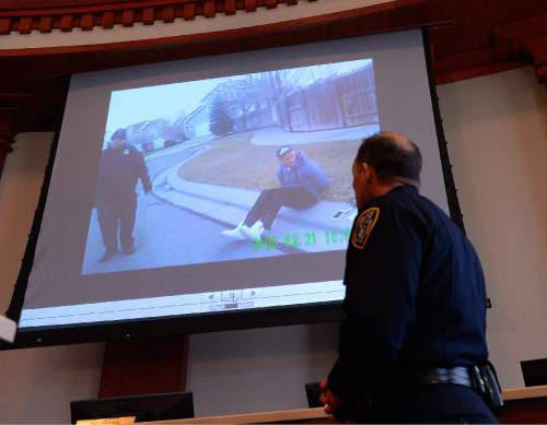 Leah Hogsten  |  The Salt Lake Tribune
The Draper City Police Department released  footage from Sgt. Davis Harris' body camera of the officer involved shooting January 14, 2015 during a press conference Friday, January 16, 2015. Jeffrey R. Nielson, 34, shown seated and handcuffed in the video's still clip on the screen was shot and killed by West Valley City officer Jason Vincent in a Draper neighborhood Wednesday morning. In the video, Nielson broke free of the officers while they were changing handcuffs on Nielson, ran to the truck and pulled the butcher knife from the glovebox while trying to escape arrest.