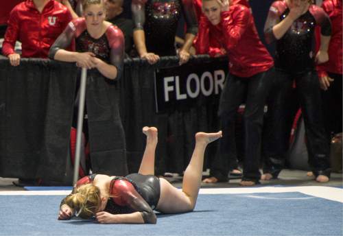 Rick Egan  |  The Salt Lake Tribune

Tory Wilson was injured as she landed on her first pass on the floor, in the Pac-12 Gymnastics Championships at the Huntsman Center, Saturday, March 21, 2015.