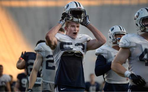 Scott Sommerdorf   |  The Salt Lake Tribune
BYU LB Ryan Jensen yelled as practice ended. BYU football had it's first scrimmage, Friday, March 27, 2015.