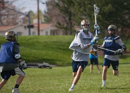 Chris Detrick  |  The Salt Lake Tribune
Members of the Skyline lacrosse team practice at Highpoint Park in Cottonwood Heights DOW} May 3, 2013.