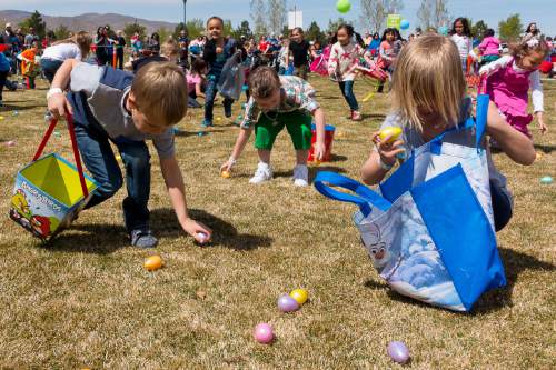 Trent Nelson  |  The Salt Lake Tribune
Children scramble to pick up eggs at Thanksgiving Point's Easter Eggstreme on Saturday.