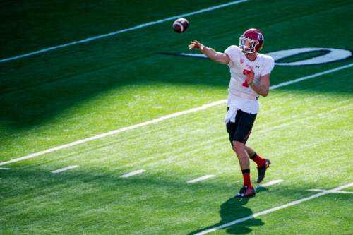 Chris Detrick  |  The Salt Lake Tribune
Utah Utes quarterback Travis Wilson (7) passes the ball during a practice at Rice-Eccles Stadium Friday April 3, 2015.