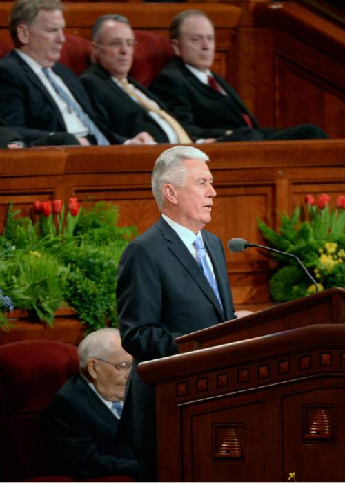 Al Hartmann  |  The Salt Lake Tribune 
Second Counselor Dieter F. Uchtdorf conducts the afternoon session of the 185th Annual LDS General Conference on Easter Sunday April 5, 2015. For a moment at the microphone he slipped into German, his native language, before switching back to English without missing a beat, bringing a good-natured laugh from the audience.