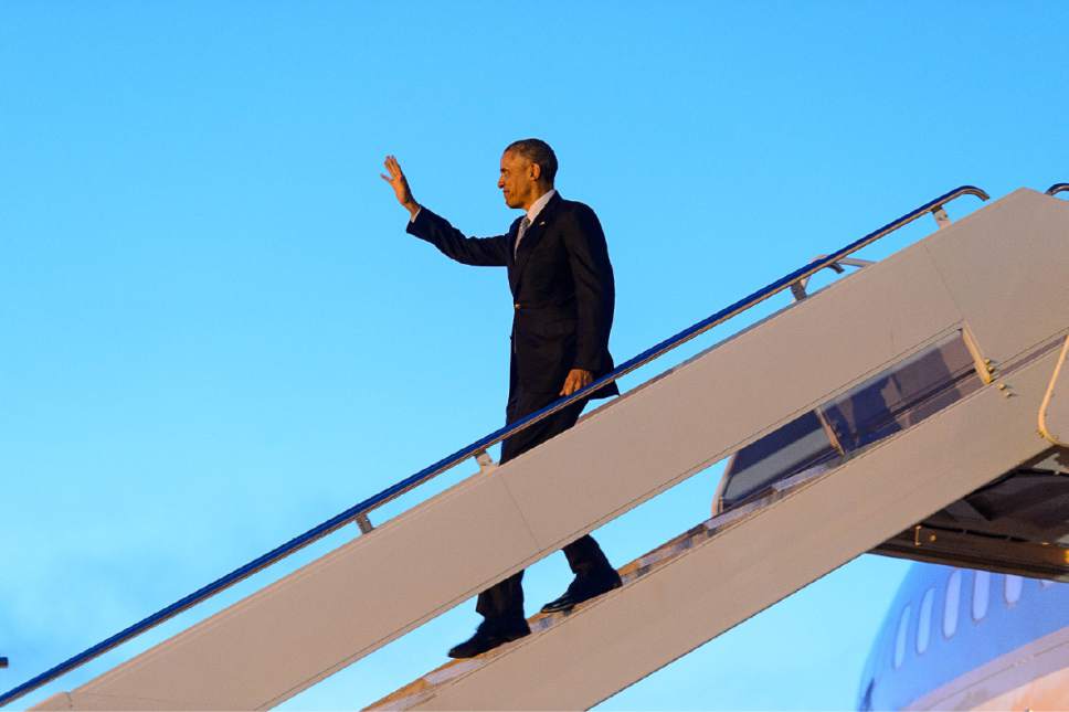 Trent Nelson  |  The Salt Lake Tribune
President Barack Obama exits Air Force One after landing at Hill Air Force Base, Thursday April 2, 2015.