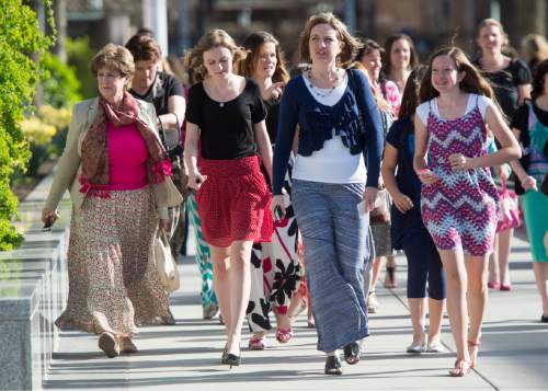 Rick Egan  |  The Salt Lake Tribune

Women walk to the conference center for the first session of the 185th LDS General Conference, designated as the General Women's Meeting, attended by all LDS females 8-years-old and older, Saturday, March 28, 2015.
