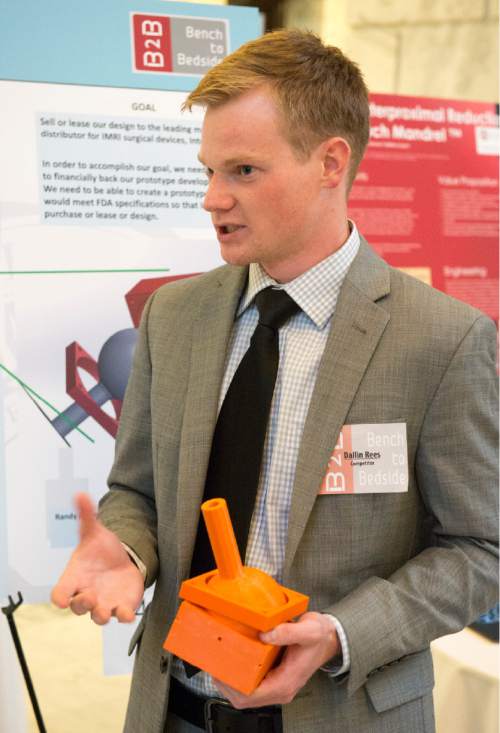 Rick Egan  |  The Salt Lake Tribune

Dallin Rees talks about the IMRI bed attachment he and a partner developed, as University of Utah students showcased a variety of inventions during the fifth annual Bench-2-Bedside (B2B) competition at the Utah State Capitol Rotunda, Wednesday, April 8, 2015.