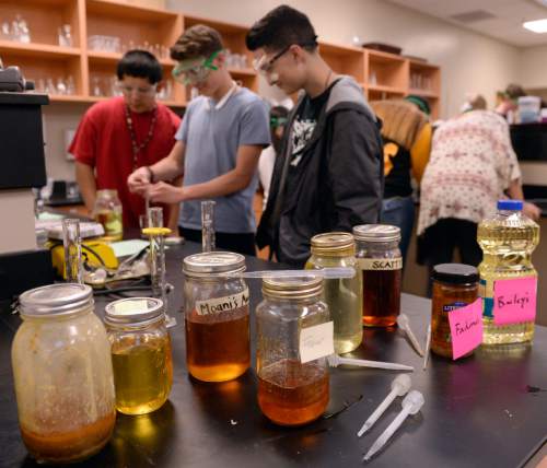 Al Hartmann  |  The Salt Lake Tribune 
Tenth-grade students at the Salt Lake Center for Science Education do experiments making biodiesel from used cooking oils from local restaurants Tuesday April 7, 2015. The state school board will vote this week on advancing new science standards that emphasize engineering and hands-on experimentation.