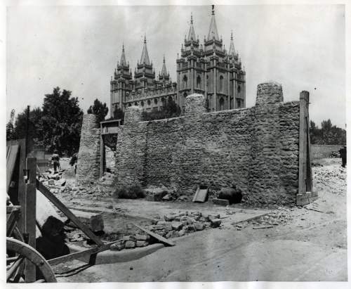 Tribune file photo

A portion of a stone wall is seen as it is torn down in the 1870s to make way for other buildings at Temple Square.