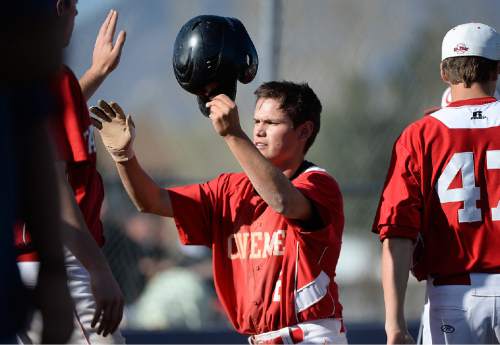 Scott Sommerdorf   |  The Salt Lake Tribune
Caveman Hayden Wood scores to give American Fork a 3-1 lead as American Fork defeated Lehi 3-1, Friday, April 10, 2015.