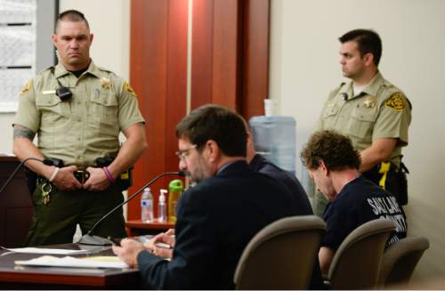 Francisco Kjolseth  |  The Salt Lake Tribune 
Johnny Brickman Wall, bottom right, appears before Judge James Blanch at the Matheson Courthouse in Salt Lake City on Monday, April 13, 2015, for a scheduling hearing, the first hearing since his murder conviction. Wall was convicted of killing his his ex-wife, Uta von Schwedler, 49, over a bitter custody dispute.