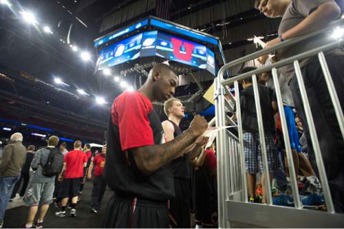 Steve Griffin  |  The Salt Lake Tribune

The University of Utah's Delon Wright signs autographs after practice at the NRG Stadium court prior to the Utes' 2015 NCAA Men's Basketball Championship Regional Semifinal game against Duke in Houston, Thursday, March 26, 2015.