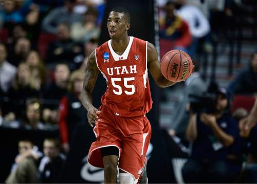Scott Sommerdorf   |  The Salt Lake Tribune
Utah Utes guard Delon Wright (55) brings the ball up during second half play. Utah defeated Georgetown 75-64 to advance to the "Sweet Sixteen", Saturday, March 21, 2015.