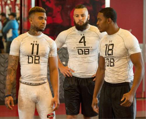 Rick Egan  |  The Salt Lake Tribune

Utah seniors Davion Orphey, Brian Belchen and Eric Rowe rest between events at Pro Day at the Alex Smith Strength & Conditioning Center, Thursday, March 26, 2015.