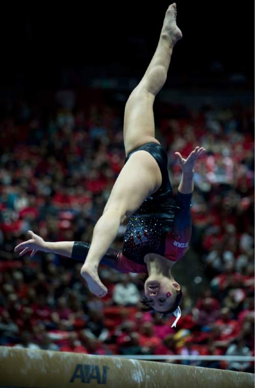 Lennie Mahler  |  The Salt Lake Tribune
Corrie Lothrop scores a 9.775 on the beam in a super meet at the Huntsman Center on Friday, Jan. 16, 2015.