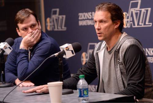 Al Hartmann  |  The Salt Lake Tribune 
Jazz first-year coach Quin Snyder, right, answersa  reporter's question during the last media availability of the season at the team's practice facility in Salt Lake City Thursday April 16, 2015. General Manager Dennis Lindsey, left, listens. Players cleaned out their lockers Thursday after Wednesday night's loss to the Houston Rockets to finish with a 38-44 record for the season.