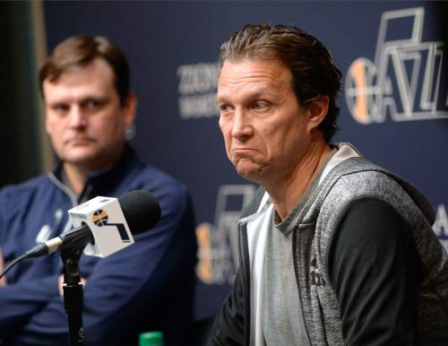 Al Hartmann  |  The Salt Lake Tribune 
Jazz first year coach Quin Snyder, right, ponders reporter's question during last media availability of the season at the team's practice facility in Salt Lake City Wednesday April 16. General Manager Dennis Lindsey, left, listens.  Players cleaned out their lockers this morning after last night's loss to the Houston Rockets to finish with a 38-44 record for the season.