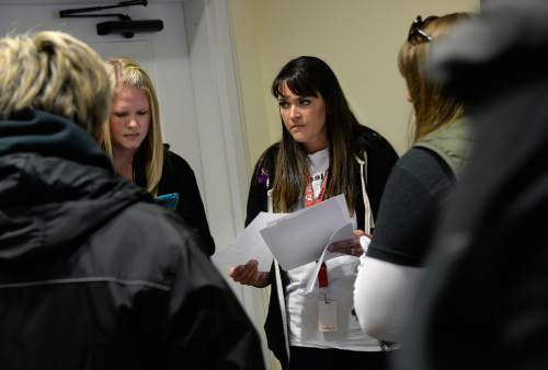 Scott Sommerdorf  |  The Salt Lake Tribune
Amy Fugal, center, briefs volunteers prior to the going out on a grid search, Saturday, November 22, 2014. Family and friends of Kayelyn Louder, with assistance from the KlaasKids Foundation, are helping to search for Kayelyn Loouder, who has been missing since Sept. 27.