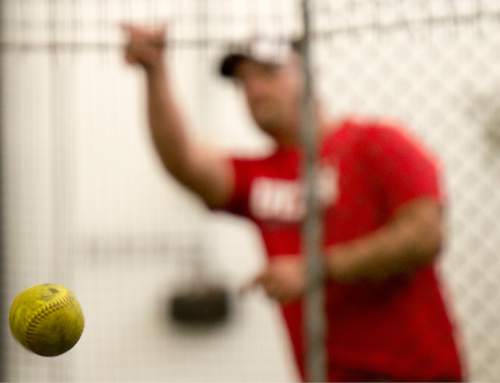 Rick Egan  |  The Salt Lake Tribune

Former USA Softball pitcher and Utah's pitching coach, Cody Thomson throws the ball during batting practice at the University of Utah, Wednesday, April 15, 2015.