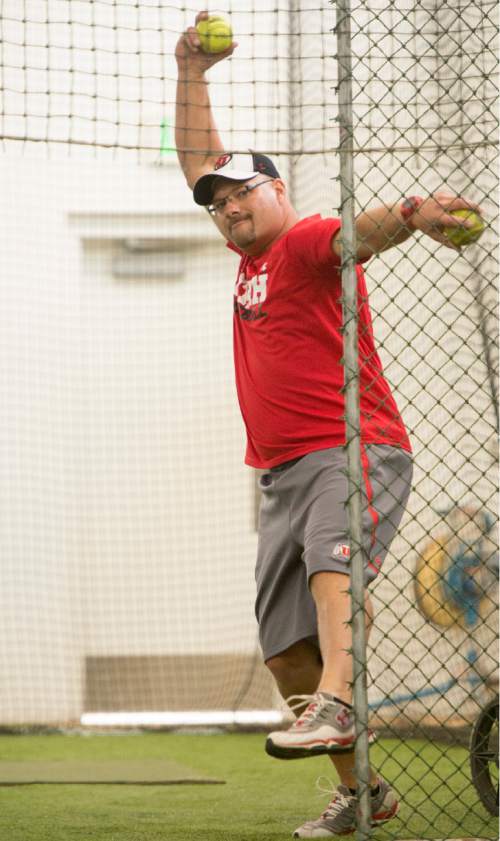 Rick Egan  |  The Salt Lake Tribune

Former USA Softball pitcher and Utah's pitching coach, Cody Thomson throws the ball during batting practice at the University of Utah, Wednesday, April 15, 2015.